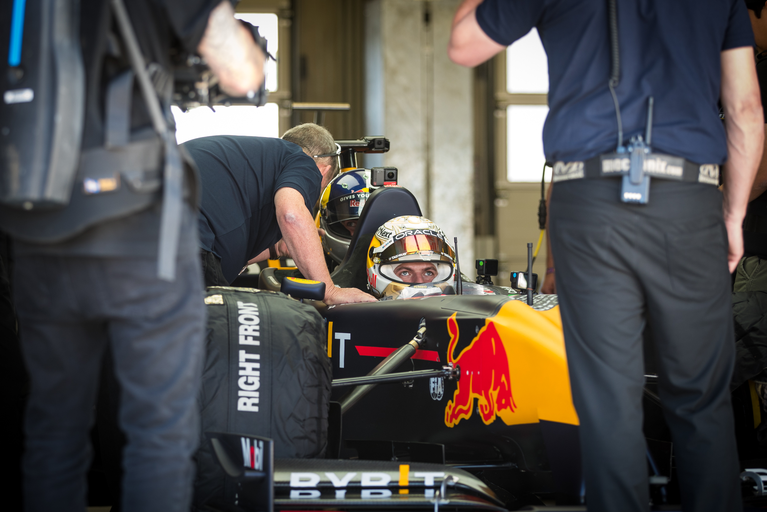 Fabio getting strapped in - Max Verstappen & Fabio Wibmer - Formula One - Seater Project - Red Bull Ring 2022